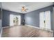 Spacious living room with hardwood floors, ceiling fan, and lots of natural light at 1009 Hopscotch Ln., Conway, SC 29526