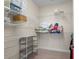 Walk-in closet with metal racks, carpeted floor, and ample storage space at 1009 Hopscotch Ln., Conway, SC 29526