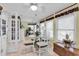 Inviting breakfast nook featuring tile floors, ample natural light, and stylish decor at 103 Robin Ct., Murrells Inlet, SC 29576