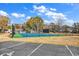 Community tennis court with fence for recreational activities and neighborhood fun at 103 Robin Ct., Murrells Inlet, SC 29576