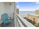 Relax on this balcony with ocean views and comfortable seating to enjoy the outdoors at 1207 S Ocean Blvd. # 51001, Myrtle Beach, SC 29577