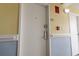 Condo doorway with updated security lock and painted walls at 1207 S Ocean Blvd. # 51001, Myrtle Beach, SC 29577