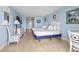 A serene bedroom featuring two beds and a dresser with a TV at 1207 S Ocean Blvd. # 51312, Myrtle Beach, SC 29577