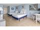 A bright bedroom features two beds and a small table with seating at 1207 S Ocean Blvd. # 51312, Myrtle Beach, SC 29577