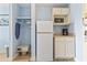 Functional kitchenette including microwave, refrigerator, and storage at 1207 S Ocean Blvd. # 51312, Myrtle Beach, SC 29577