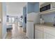 Comfortable living space with two beds, vanity and kitchenette at 1207 S Ocean Blvd. # 51312, Myrtle Beach, SC 29577