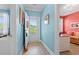 Bright foyer with beachy blue walls and wood-look floors at 131 Waypoint Ridge Ave. # Q26, Little River, SC 29566