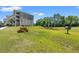 Outdoor picnic table and barbecue grill near a small pond by the building at 131 Waypoint Ridge Ave. # Q26, Little River, SC 29566