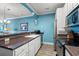 Functional kitchen with stainless steel appliances, white cabinetry, and countertop seating for casual dining at 131 Waypoint Ridge Ave. # Q26, Little River, SC 29566