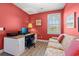 Bright living room with a floral couch and a view from the window at 131 Waypoint Ridge Ave. # Q26, Little River, SC 29566