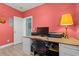 Coral-toned living room with a desk, PC, and a comfy chair at 131 Waypoint Ridge Ave. # Q26, Little River, SC 29566