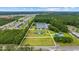 Aerial view showing approximate property lines of land including the lake and the house at 1342 Highway 90, Conway, SC 29526