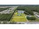Aerial view showing approximate property lines of land including the lake and the house at 1342 Highway 90, Conway, SC 29526