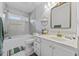 Updated bathroom featuring a marble vanity, gold accents, and tiled shower at 1342 Highway 90, Conway, SC 29526