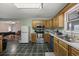 Functional kitchen with stainless steel appliances, ample cabinet space, and tile floor at 1342 Highway 90, Conway, SC 29526