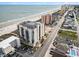 Aerial view of oceanfront condo building showing beach access at 1425 S Ocean Blvd. # 2A, North Myrtle Beach, SC 29582