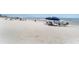 Relaxing beach view with beach umbrellas and people enjoying the sun and surf at 1425 S Ocean Blvd. # 2A, North Myrtle Beach, SC 29582