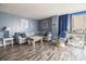 Comfortable living room featuring a sectional sofa, accent chair, and light blue painted walls at 1425 S Ocean Blvd. # 2A, North Myrtle Beach, SC 29582