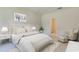Cozy bedroom featuring neutral tones, soft lighting, and comfortable seating at 144 Warner Crossing Way, Loris, SC 29569
