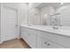 Modern bathroom with double vanity, white cabinetry, and tile floors at 1560 Swing Bridge Way, Myrtle Beach, SC 29588