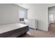 Bedroom features a large window with blinds and a white dresser for ample storage at 1560 Swing Bridge Way, Myrtle Beach, SC 29588