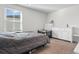 Bedroom features a window with blinds and a changing table at 1560 Swing Bridge Way, Myrtle Beach, SC 29588