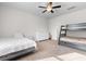 Bright bedroom with a bunk bed, carpeted floors, and lots of natural light at 1560 Swing Bridge Way, Myrtle Beach, SC 29588