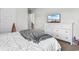 Bedroom features a TV, window with blinds and a white dresser at 1560 Swing Bridge Way, Myrtle Beach, SC 29588
