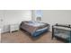 Bedroom features a window with blinds and a gray baby bassinet at 1560 Swing Bridge Way, Myrtle Beach, SC 29588