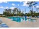 Community pool area with lounge chairs, perfect for relaxation and recreation at 1560 Swing Bridge Way, Myrtle Beach, SC 29588