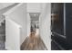 Inviting entryway with wood-look flooring leads into a bright, open-concept living space at 1560 Swing Bridge Way, Myrtle Beach, SC 29588