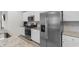 Updated kitchen features granite counters, stainless appliances, and ample storage space at 1560 Swing Bridge Way, Myrtle Beach, SC 29588