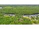 Lush aerial shot of riverfront community with home nestled in mature trees at 1936 Lees Landing Circle, Conway, SC 29526