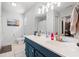 Bathroom with double sink vanity with ample lighting and a separate toilet and closet area at 1936 Lees Landing Circle, Conway, SC 29526