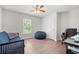 Bedroom with a window, ceiling fan, comfortable furniture, and hardwood floors at 1936 Lees Landing Circle, Conway, SC 29526