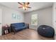 This bedroom features a futon, beanbag, and light hardwood flooring at 1936 Lees Landing Circle, Conway, SC 29526