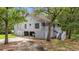 Charming elevated home with classic siding, inviting porch, and convenient drive-under parking at 1936 Lees Landing Circle, Conway, SC 29526