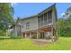 View of screened porch, yard and lower level from the rear of the house at 1936 Lees Landing Circle, Conway, SC 29526