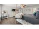 Bright main bedroom with TV, ensuite bath, and comfortable decor elements at 1936 Lees Landing Circle, Conway, SC 29526