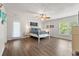Spacious main bedroom with ceiling fan, ensuite bathroom, and access to backyard at 1936 Lees Landing Circle, Conway, SC 29526