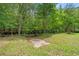 Beautiful wooded backyard with a small creek provides a tranquil setting at 1936 Lees Landing Circle, Conway, SC 29526