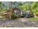 Side view of a brick home showing the deck and fenced yard at 196 John Waites Ct., Georgetown, SC 29440