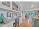 Bright kitchen with island, marble countertops, stainless steel appliances, and hardwood floors at 196 John Waites Ct., Georgetown, SC 29440