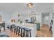 Bright kitchen with island, marble countertops, stainless steel appliances, and hardwood floors at 196 John Waites Ct., Georgetown, SC 29440