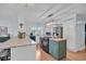 Bright kitchen with island, marble countertops, stainless steel appliances, and hardwood floors at 196 John Waites Ct., Georgetown, SC 29440