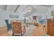 Spacious living room featuring a vaulted ceiling, wood floors, and comfortable seating arrangement at 196 John Waites Ct., Georgetown, SC 29440