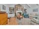 Inviting living room featuring a brick fireplace, built-in shelving, and comfortable seating at 196 John Waites Ct., Georgetown, SC 29440