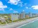 Expansive aerial view of beachfront condos along the coastline, offering stunning ocean views at 2000 N Ocean Blvd. # Ph 15, Myrtle Beach, SC 29577