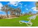 Relaxing beach area with swings, hammocks, lounge chairs, and palm trees for a serene vacation experience at 2000 N Ocean Blvd. # Ph 15, Myrtle Beach, SC 29577