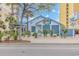 Charming beachside restaurant with a vibrant exterior and lush landscaping, creating an inviting atmosphere at 2000 N Ocean Blvd. # Ph 15, Myrtle Beach, SC 29577